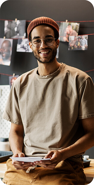 Man smiling in darkroom